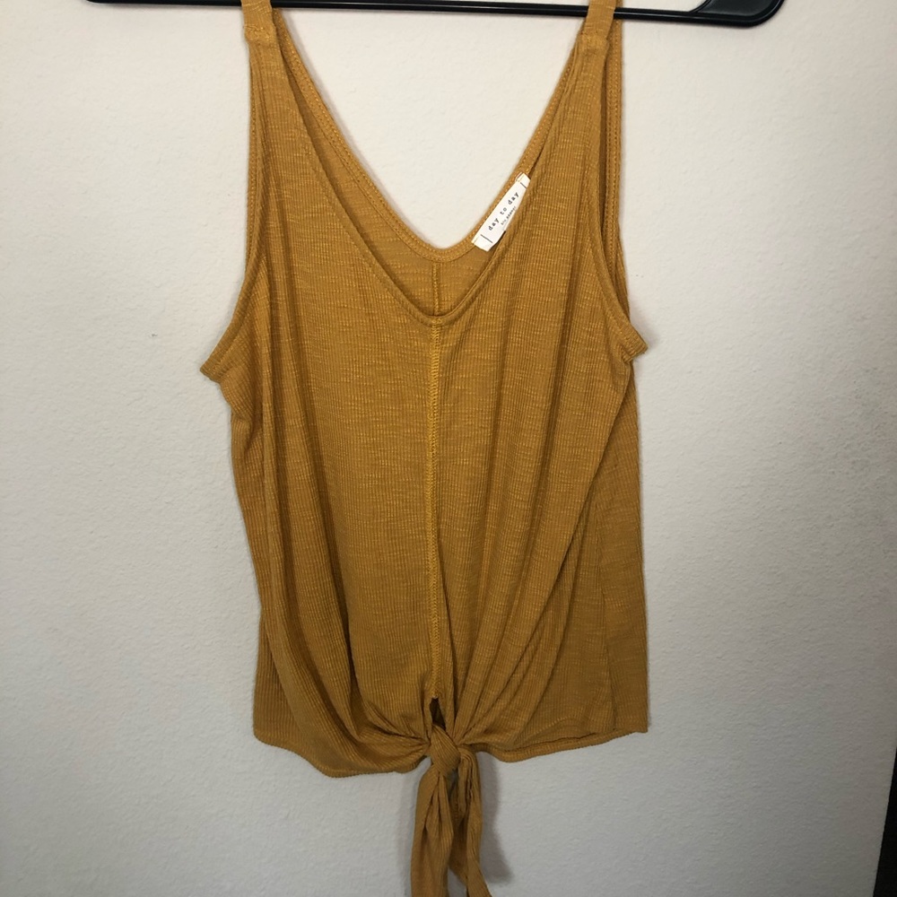 Yellow tank top with cross design in front